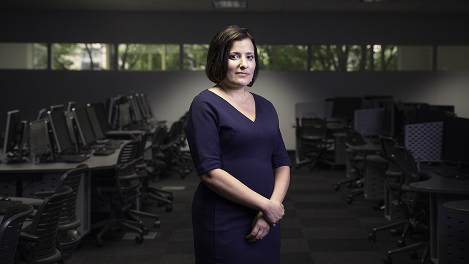 Sara Goldrick-Rab standing in a computer lab.