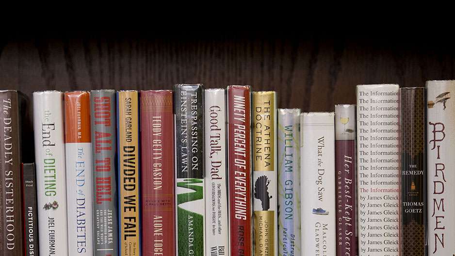 Books on a bookshelf in Samuel Paley Library.