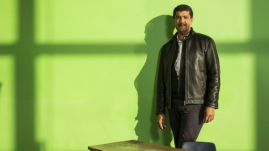 Pep n Osorio standing in front of a green wall.