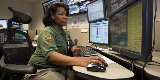 Phylicia Rosario working at a computer.