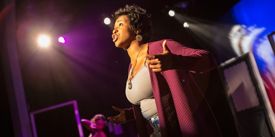 A Temple theater student performing in a stage production.