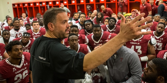 Coach Rhule in the locker room after football s tenth win over UConn.