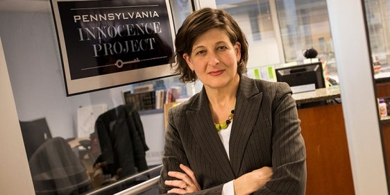 Marissa Bluestine standing in the Pennsylvania Innocence Project s doorway.