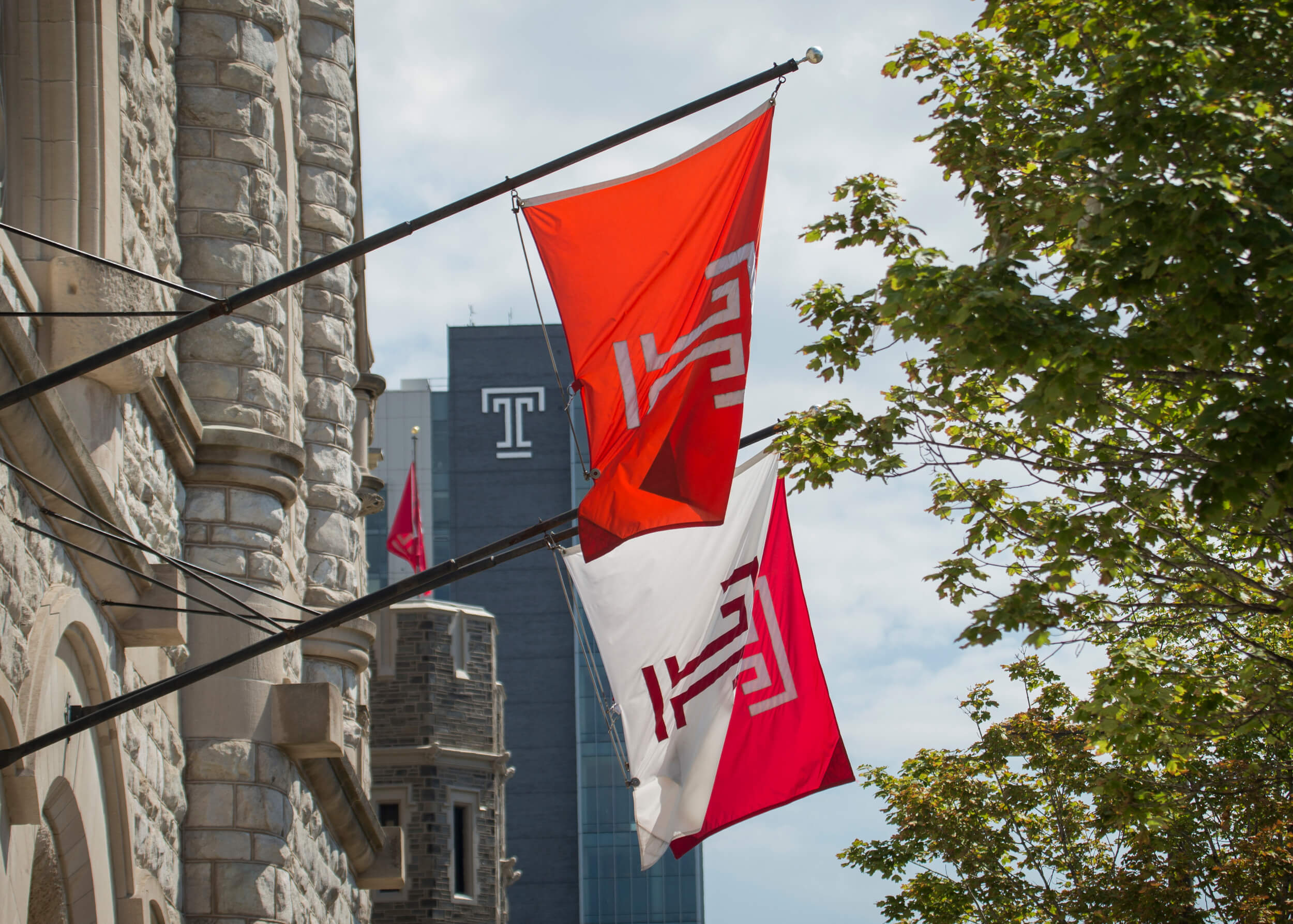 Temple flags flying on campus.