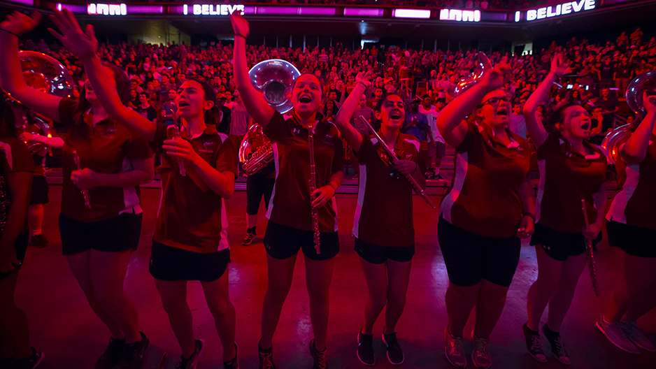 Members of the Diamond Marching Band cheering at Convocation.