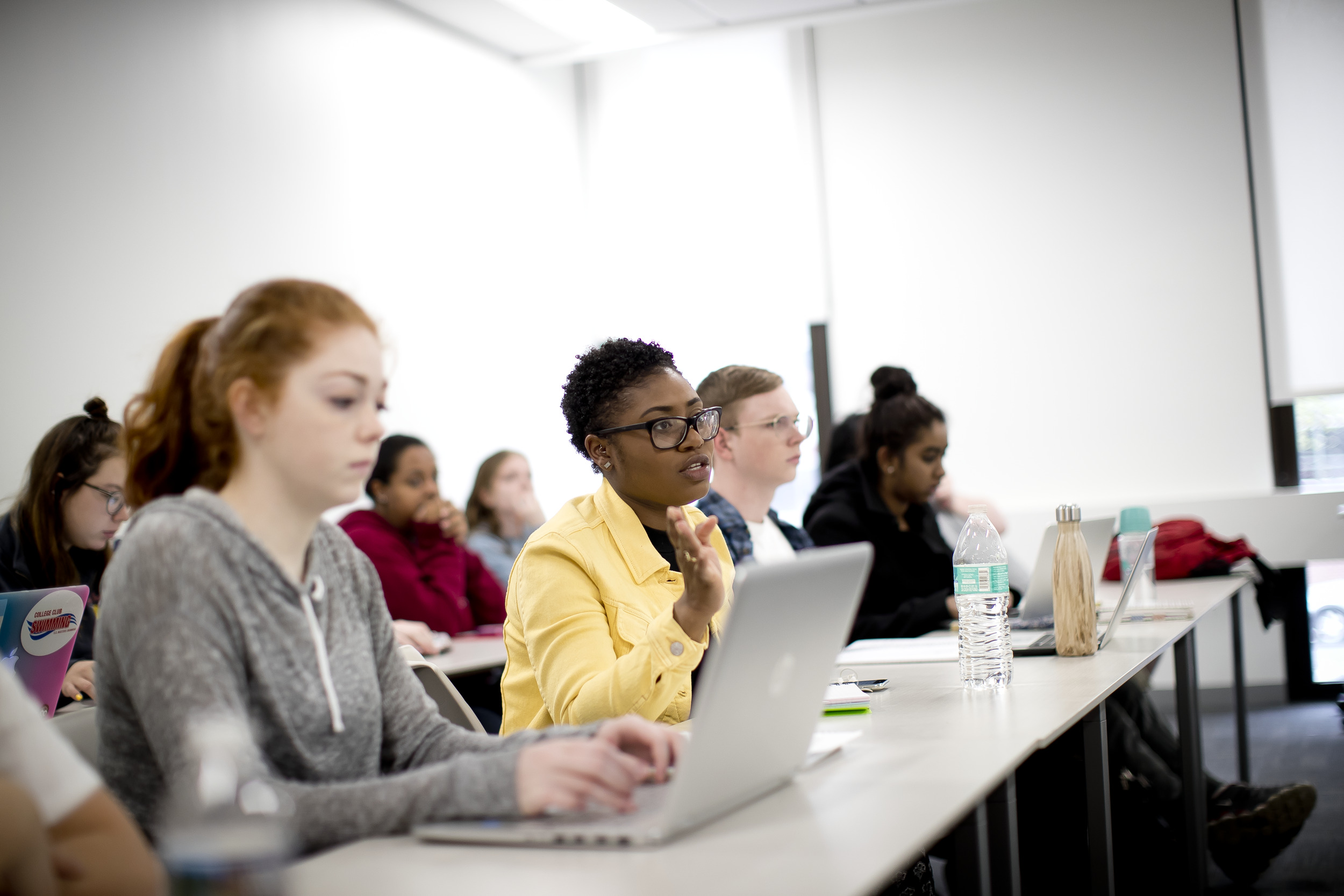 Students using computers in a classroom