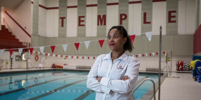Angela Beale standing by Pearson Pool