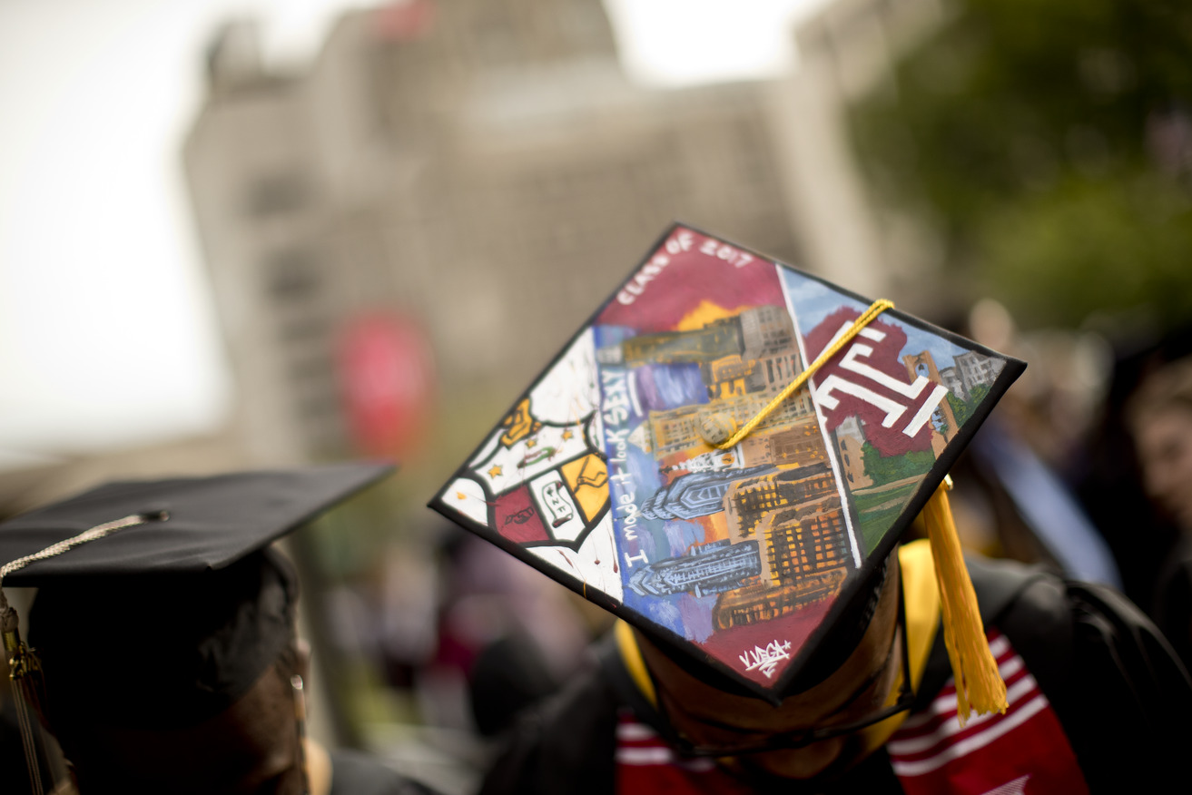 Image of a Temple graduate in their cap.