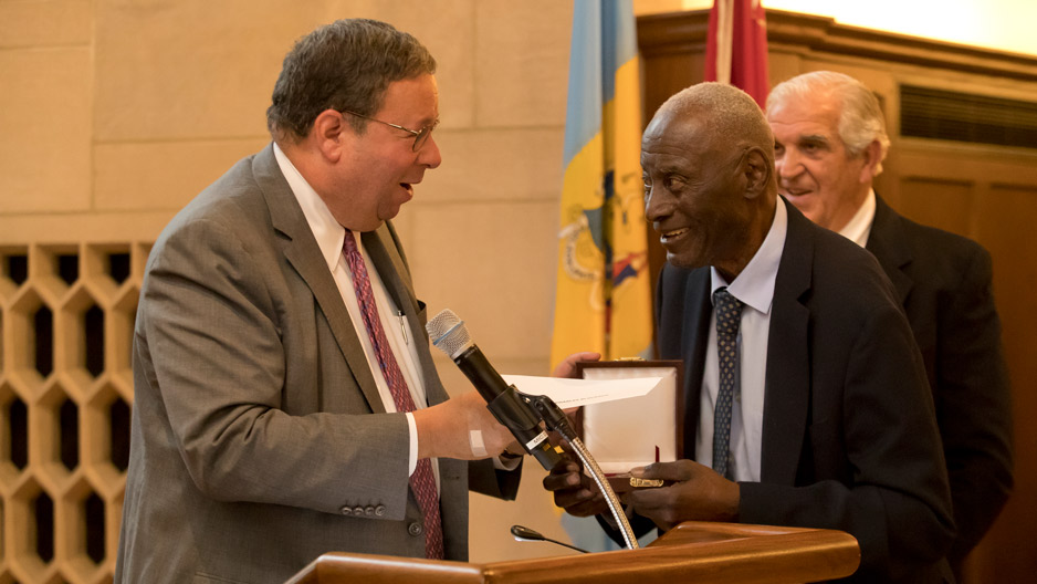 David Cohen presenting historian Charles L. Blockson with the Philadelphia Award