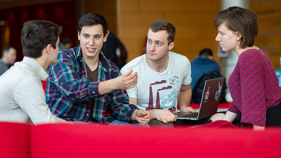 Engineers Without Borders student leaders discussing a project