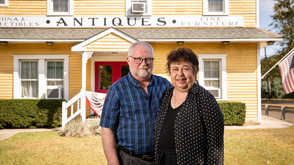 Mary DeMaio and Wayne Stewart outside their antique shop in Cape May