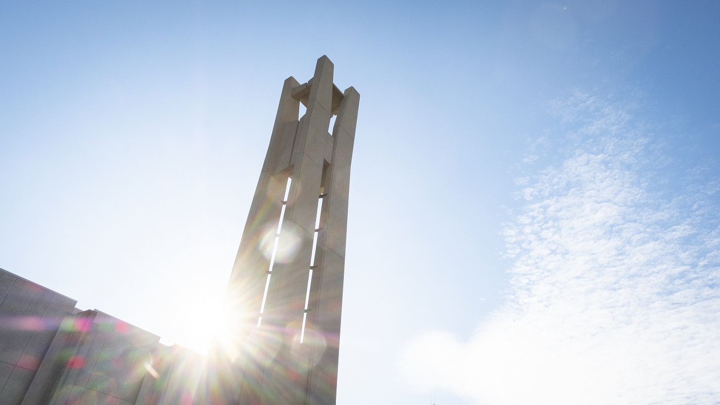 A sunbeam shining behind the Bell Tower.