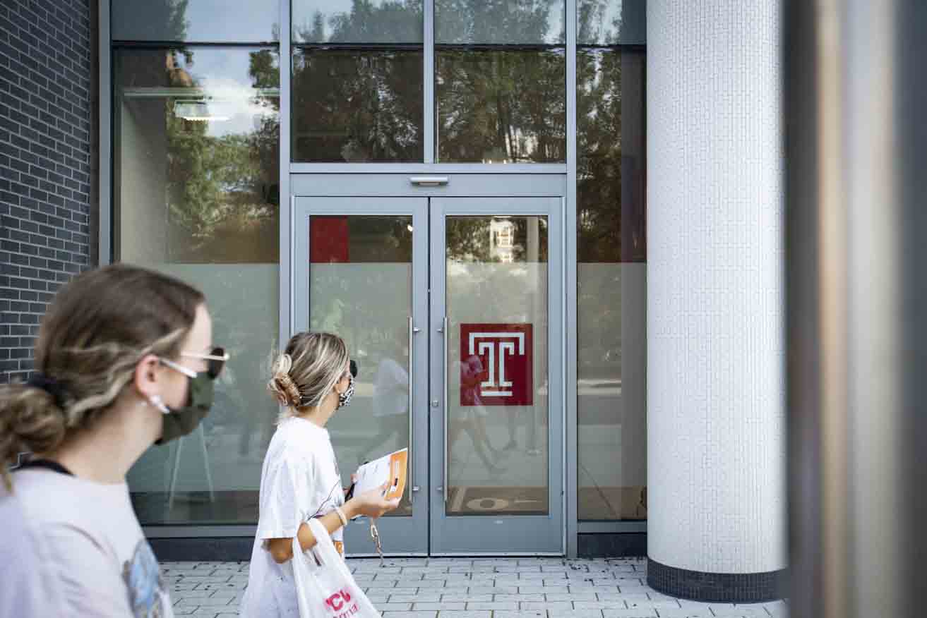 Students walk along Cecil B. Moore Avenue.