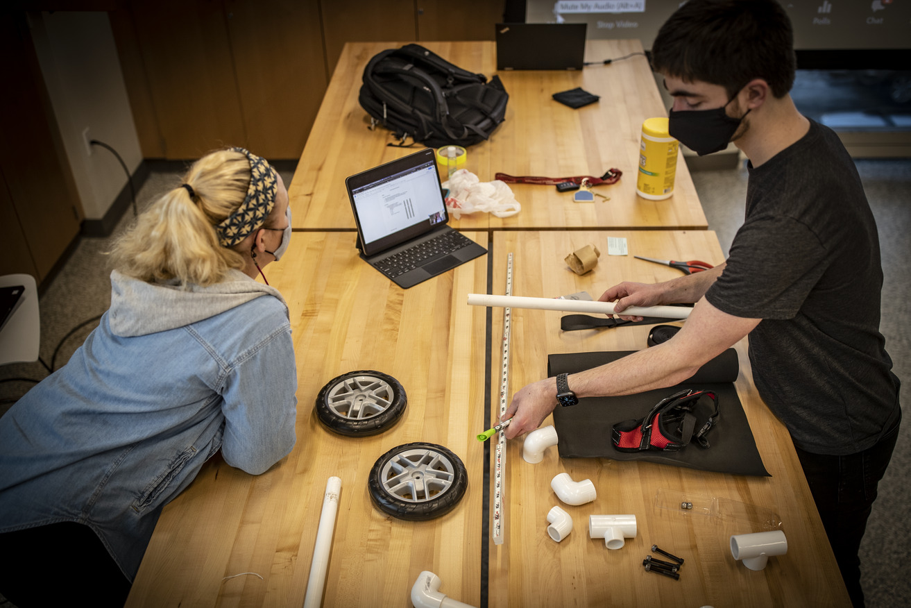 Temple students building prototype for a puppy wheelchair.