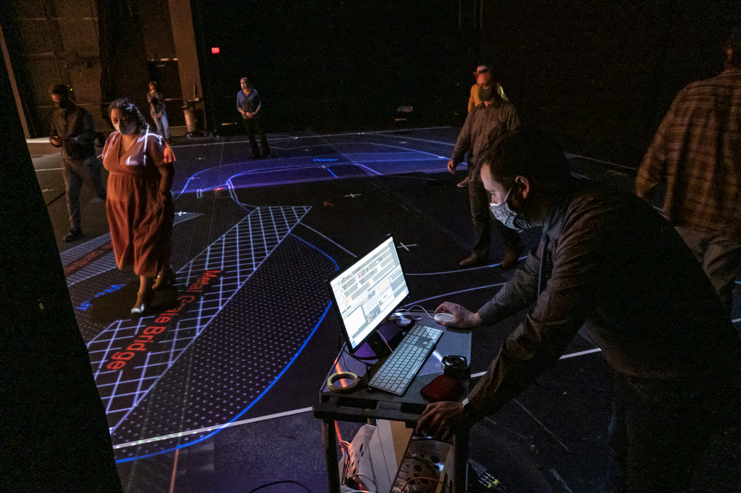Temple University faculty try out a new projection mapping system.