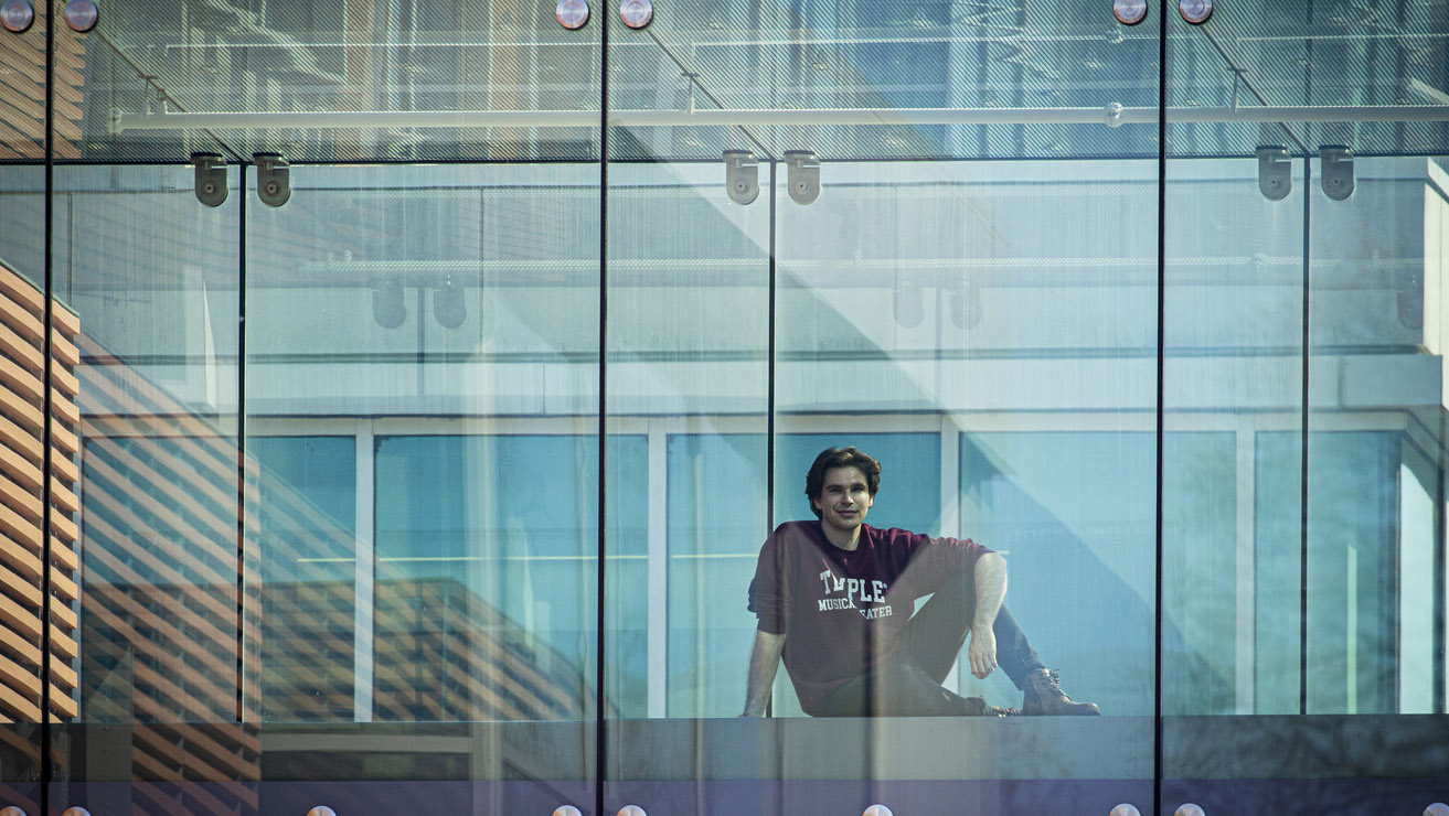 William Hornby viewed through a glass window