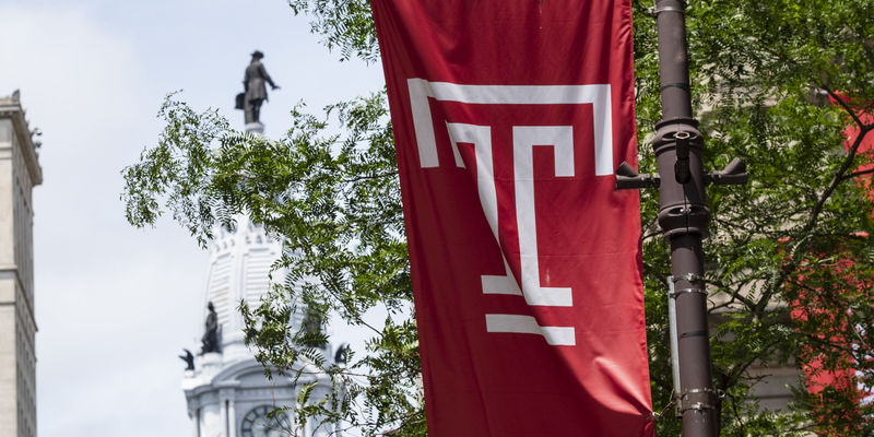 Temple flag flying in Center City.