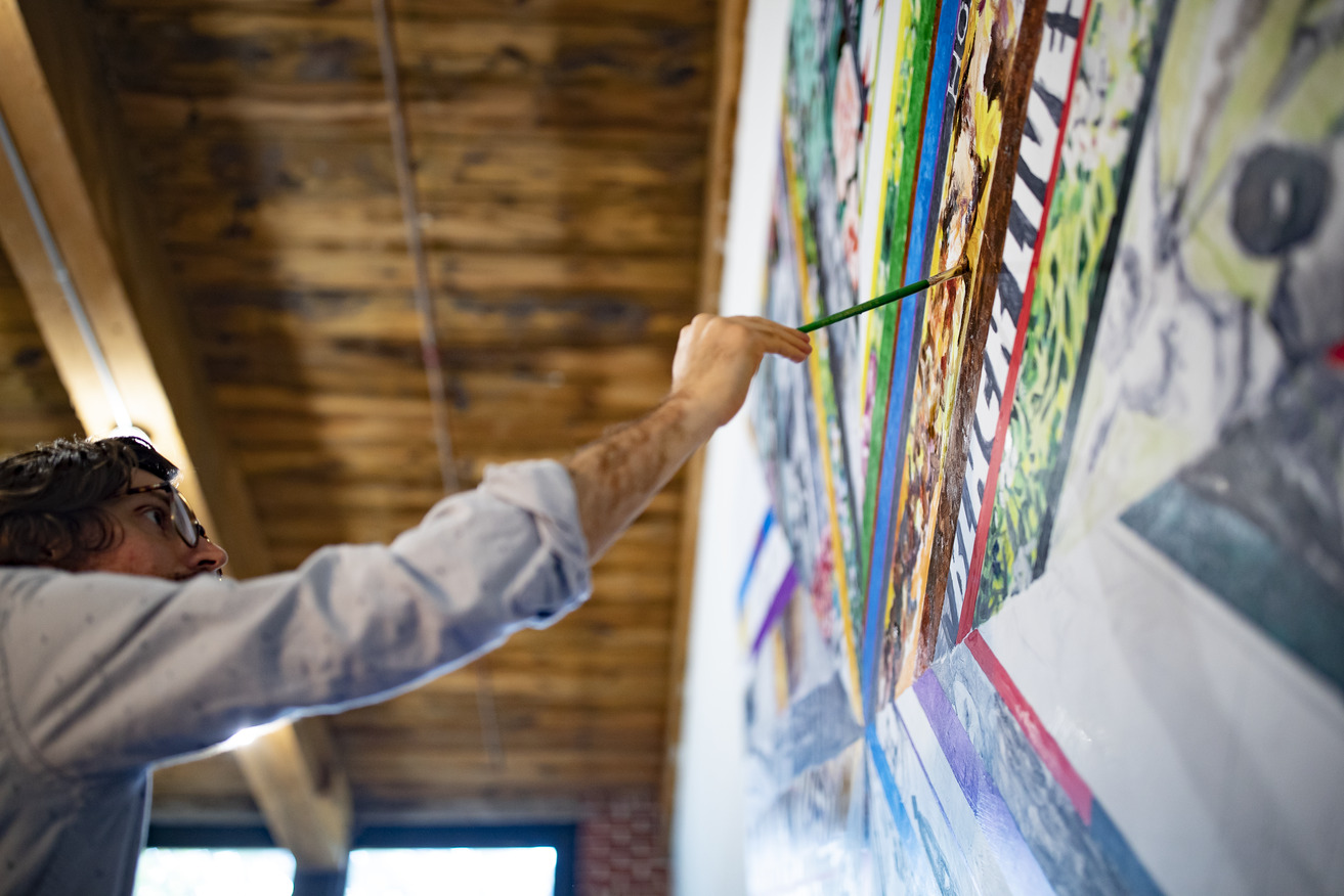 Temple alumnus Mat Tomezsko at work on the