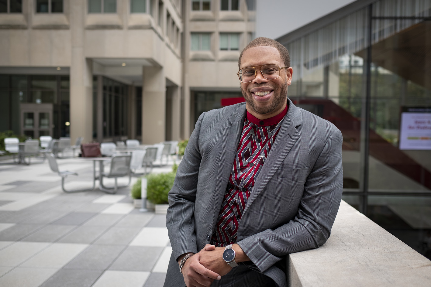 Timothy Welbeck, a professor at Temple University posing outside at the rooftop terrace of Mazur and Gladfelter halls.