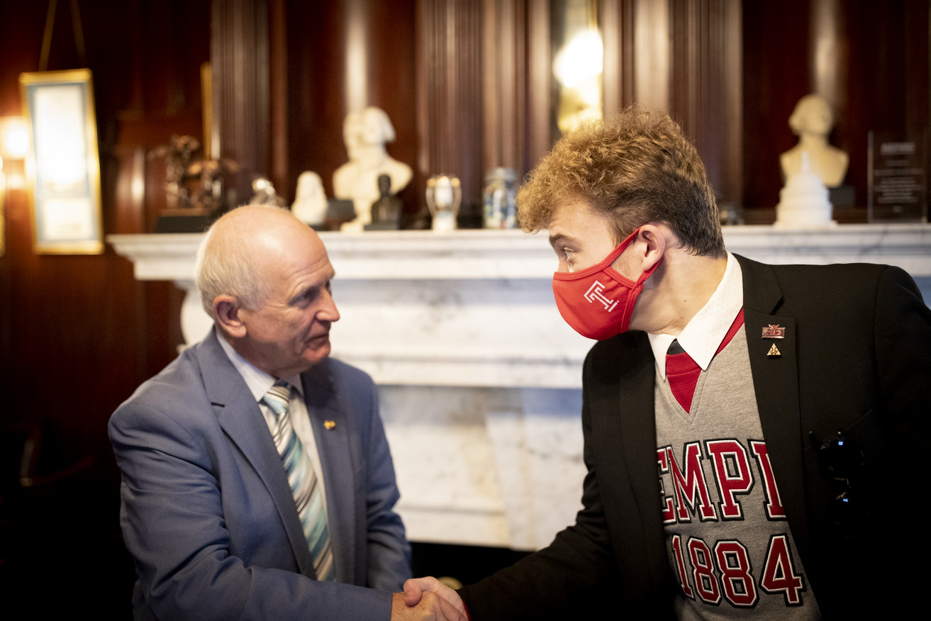 Image of Temple student shaking hands with a PA state legislator.