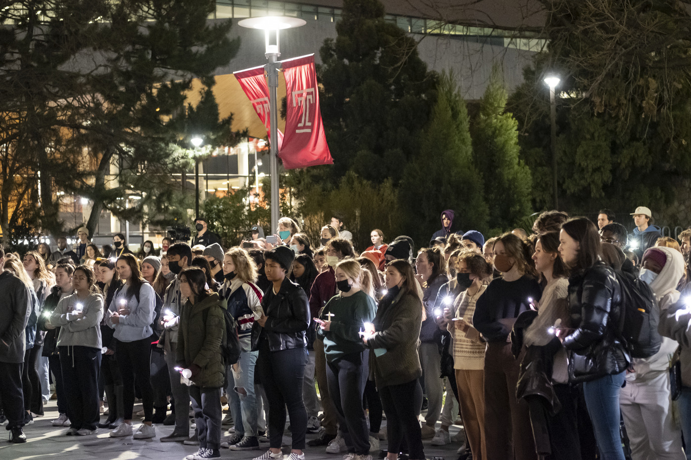 Students participate in a candlelight vigil on Main Campus.
