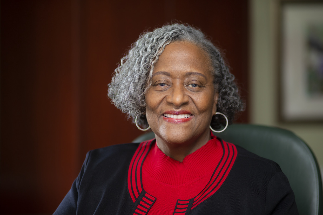 Image of Theresa Powell sitting in a chair.