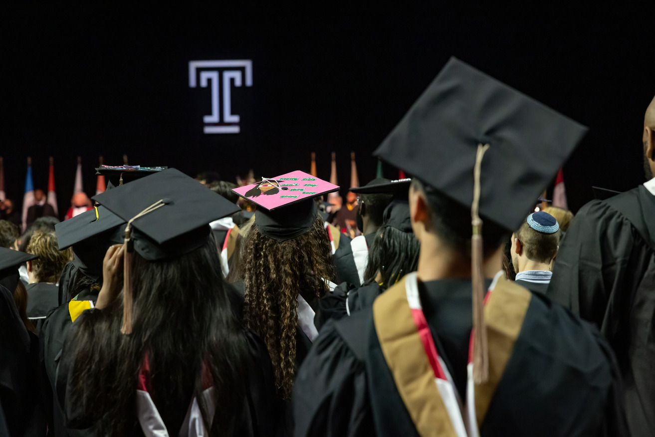 Image of graduates looking towards the stage at Temple s 135th Commencement.