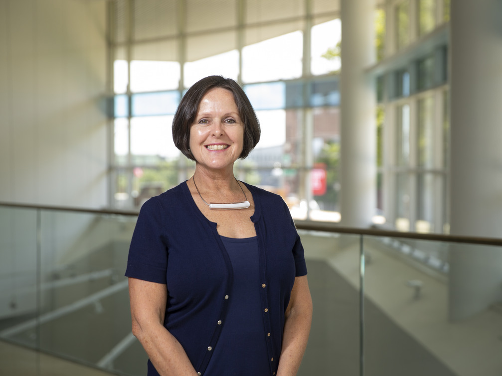 Magee stands in the atrium of Boyer College of Music and Dance