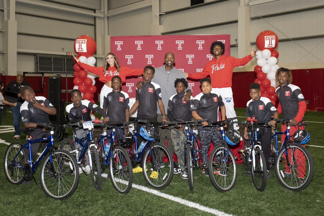 Adults and children together at Temple s community appreciation night.