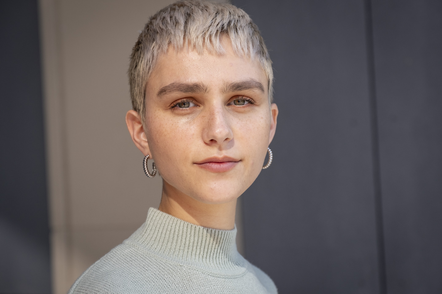 Image of Courtney Kater in a sweater.