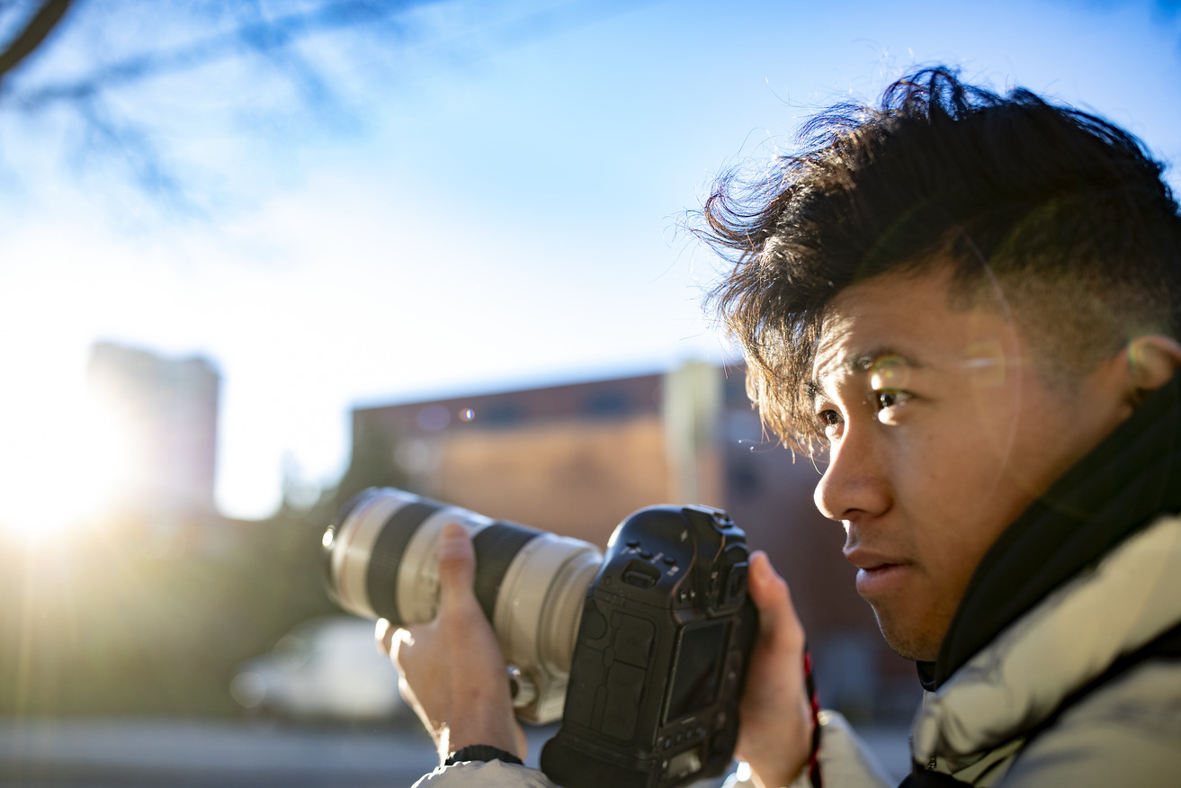 Rich Le holding his camera