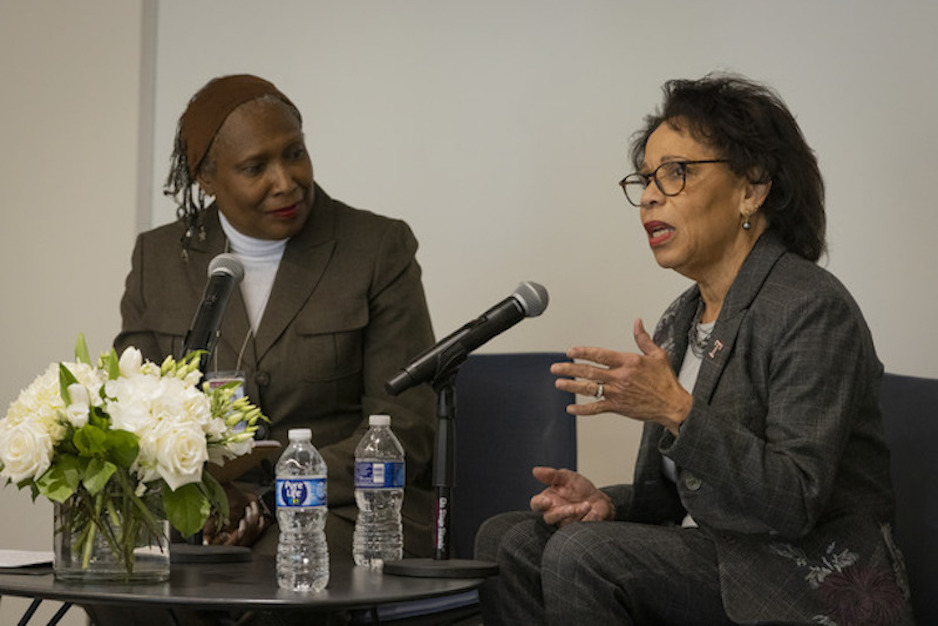 President Epps and Kimmika Williams-Witherspoon talking