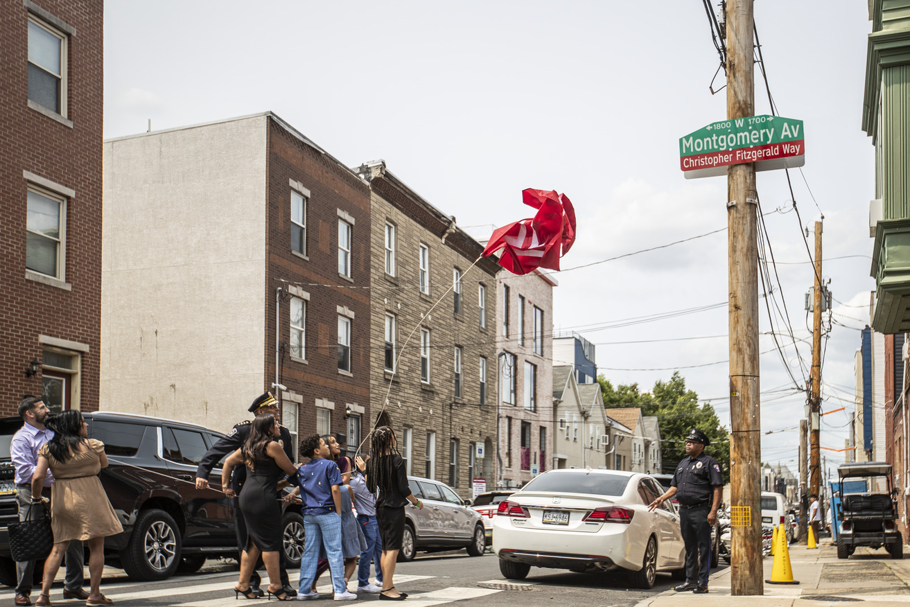 Image of the newly revealed street sign, Christopher Fitzgerald Way.