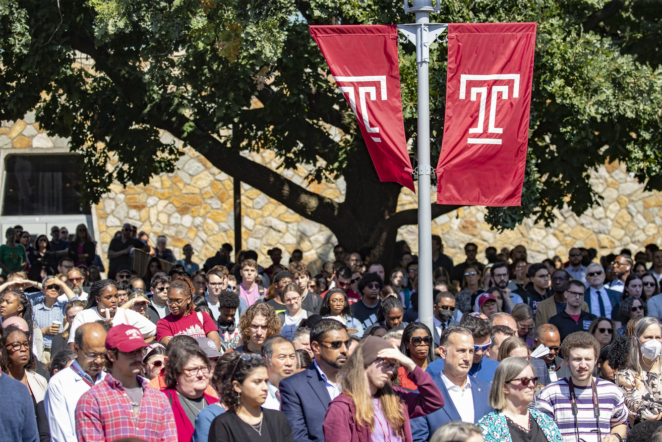 A crowd of people standing on Beury Beach