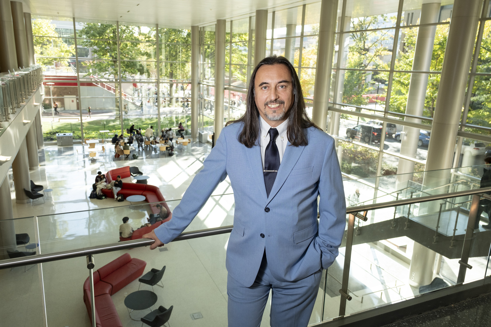 Dean Miguel Mostaf standing near the railing in the Science and Education Research Center