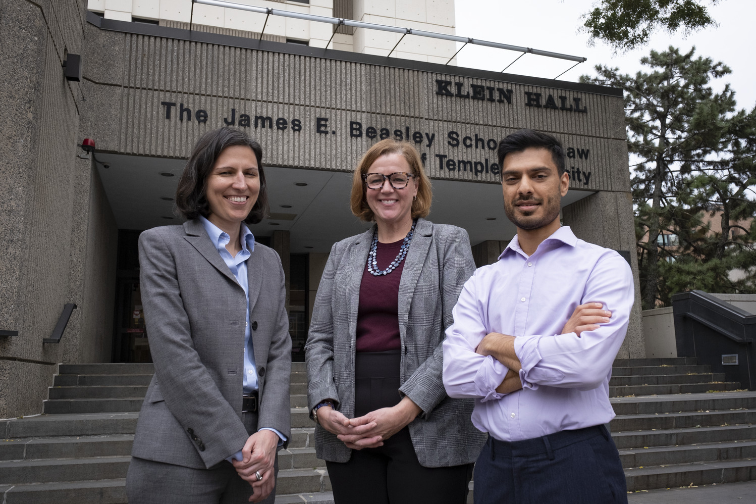 Image of Rickabaugh, Levy and Shah in front of Klein Hall.