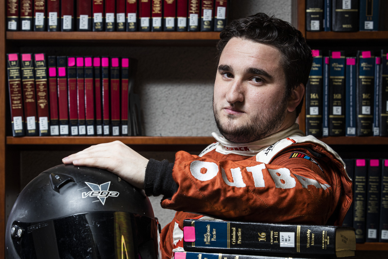 Image of a NASCAR driver inside Temple University s Law School.