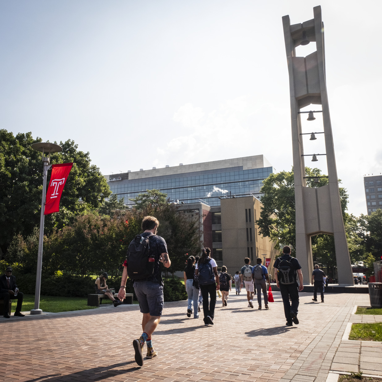 Students walking by the bell tower