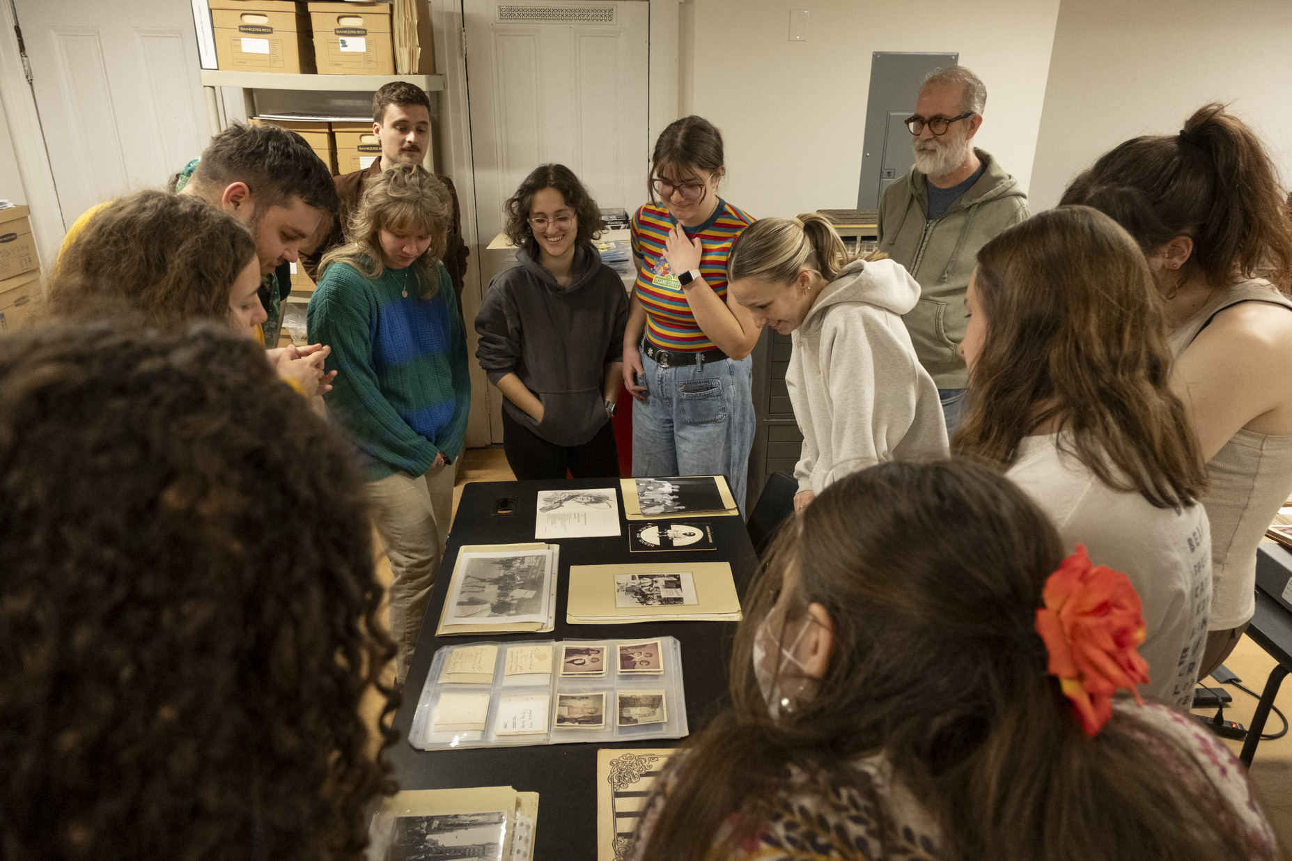 Students looking at archival materials in the William Way LGBT Community Center