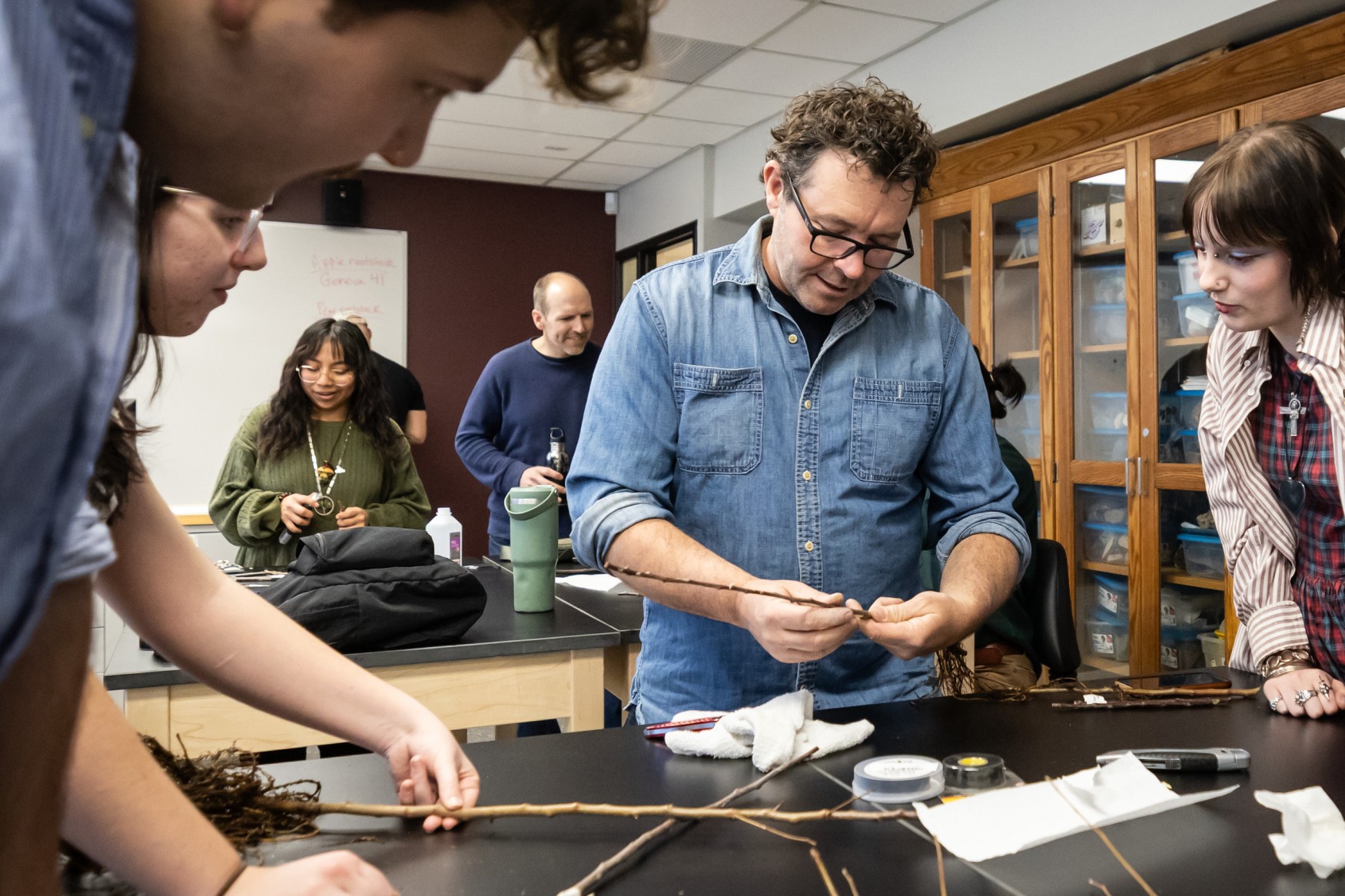 Sam Van Aken working with students