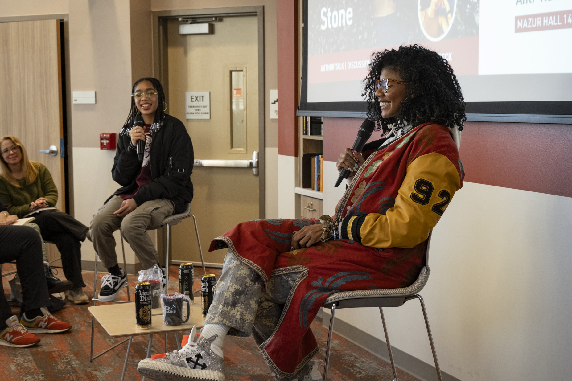 A photo of author Nic Stone speaking on Temple's campus.
