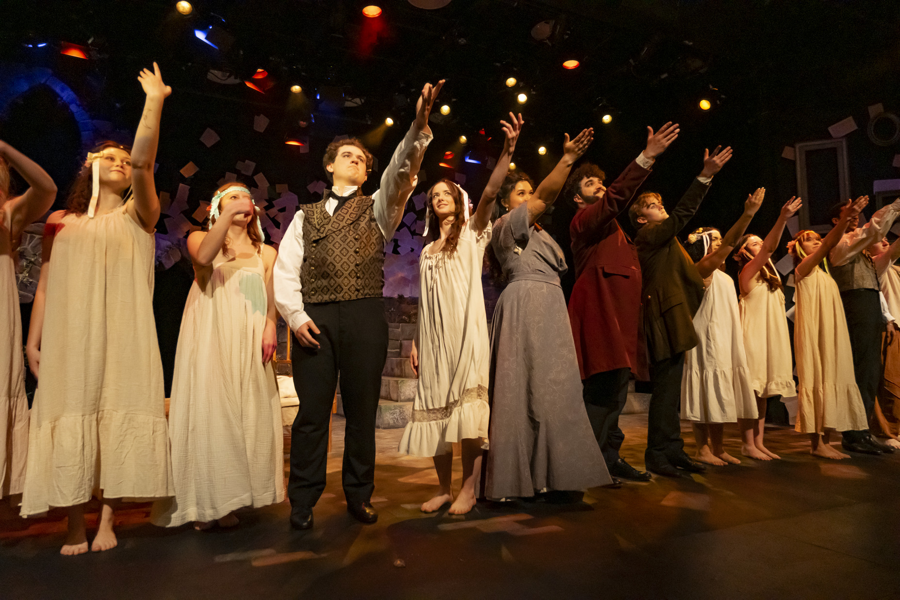 Image of the cast of Goblin Market performing on stage.