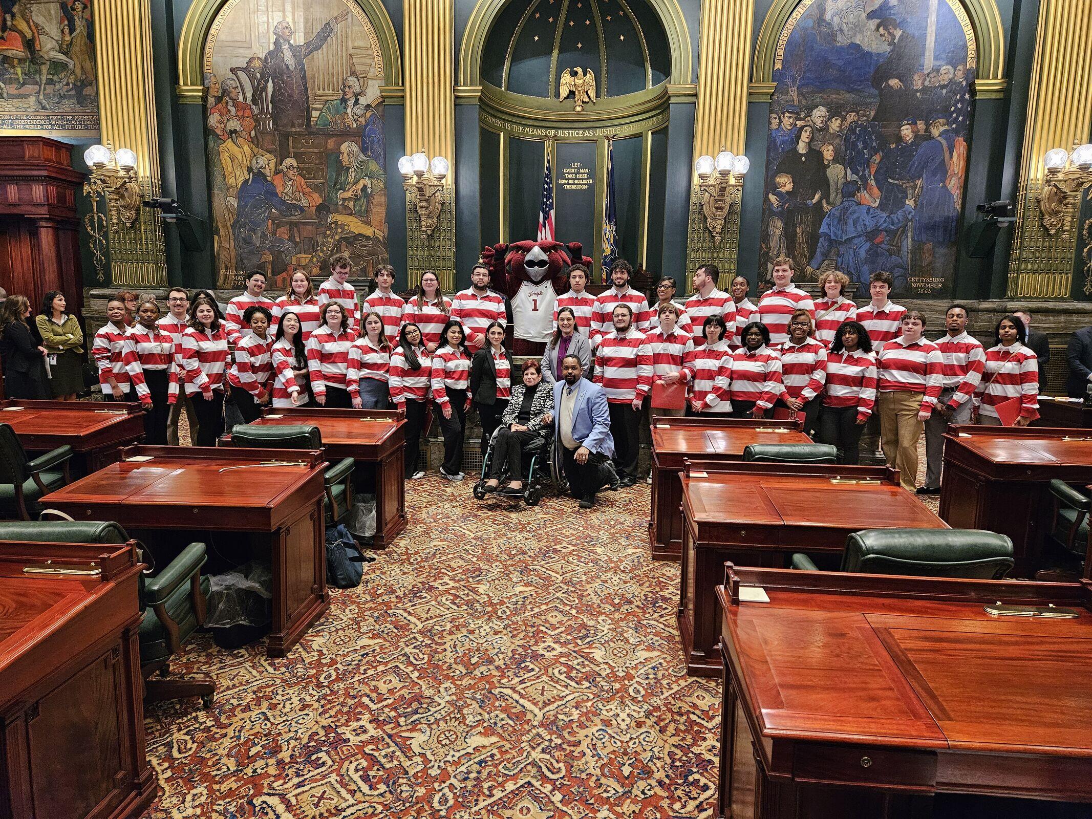 Students, Hooter, Sen. Christine Tartaglione (D-2), Sen. Amanda Cappelletti (D-17), and Sen. Sharif Street (D-3) on the floor of the Senate of Pennsylvania.