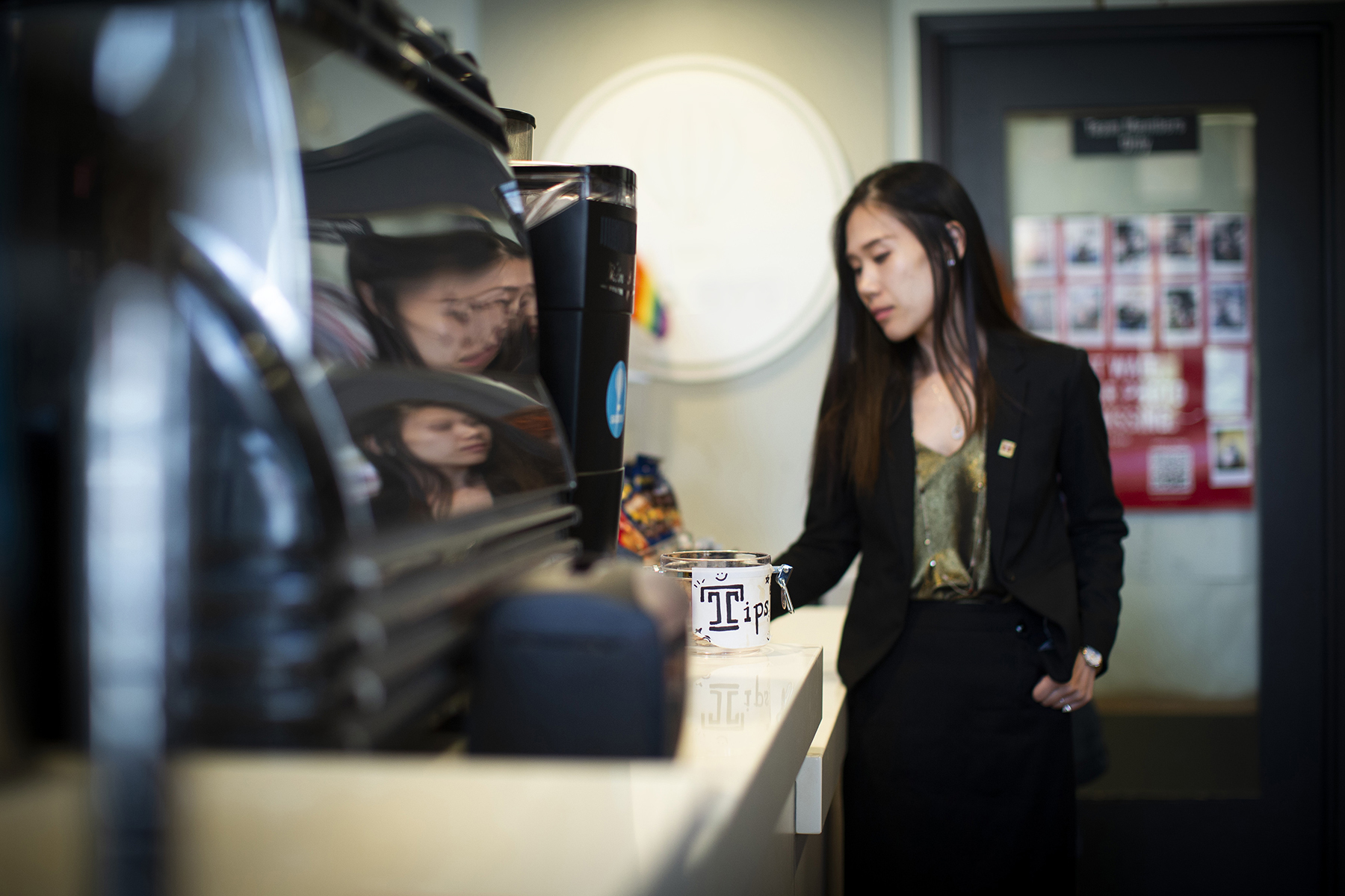 STHM faculty member Lu Lu pictured giving a tip.