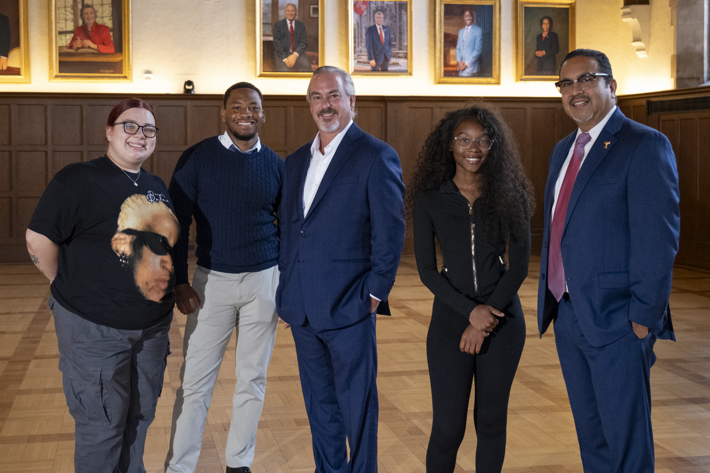 Philanthropist Brook J. Lenfest, Temple Vice President of Enrollment and Student Success Jose Aviles and three students who received scholarships are pictured.