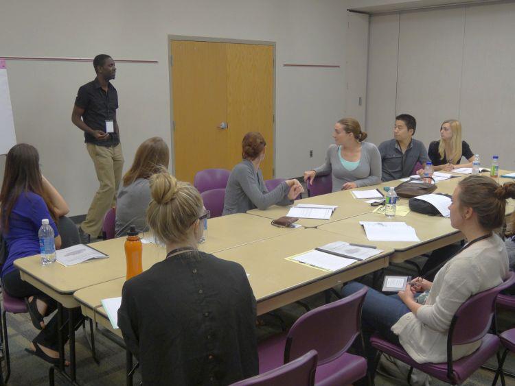 students discussing leadership