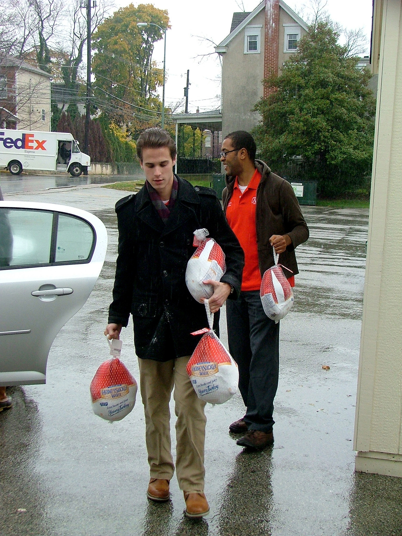Students deliver turkeys to the Mattie Dixon Community Cupboard in Ambler Borough.
