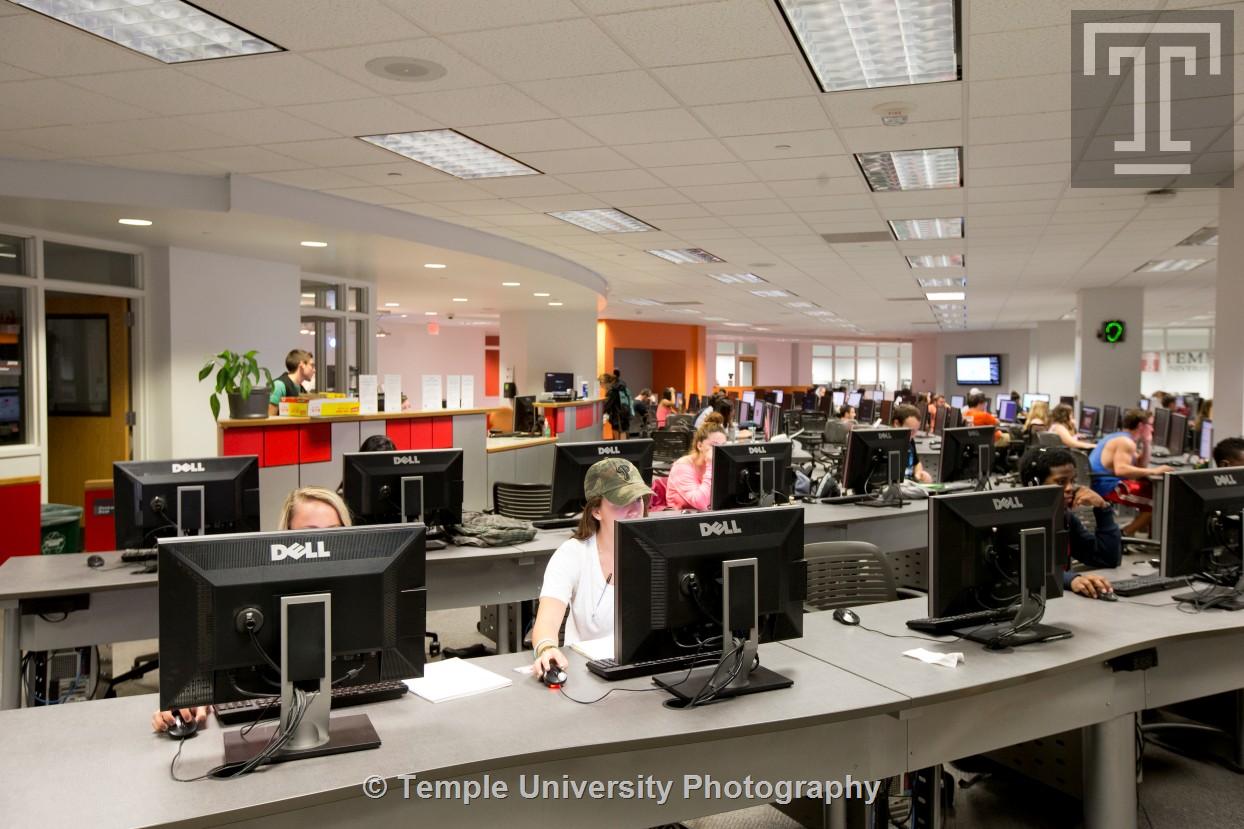 students working at computers it the tech center