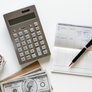 calculator, pen and w-2 form
