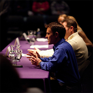 People in a panel discussion
